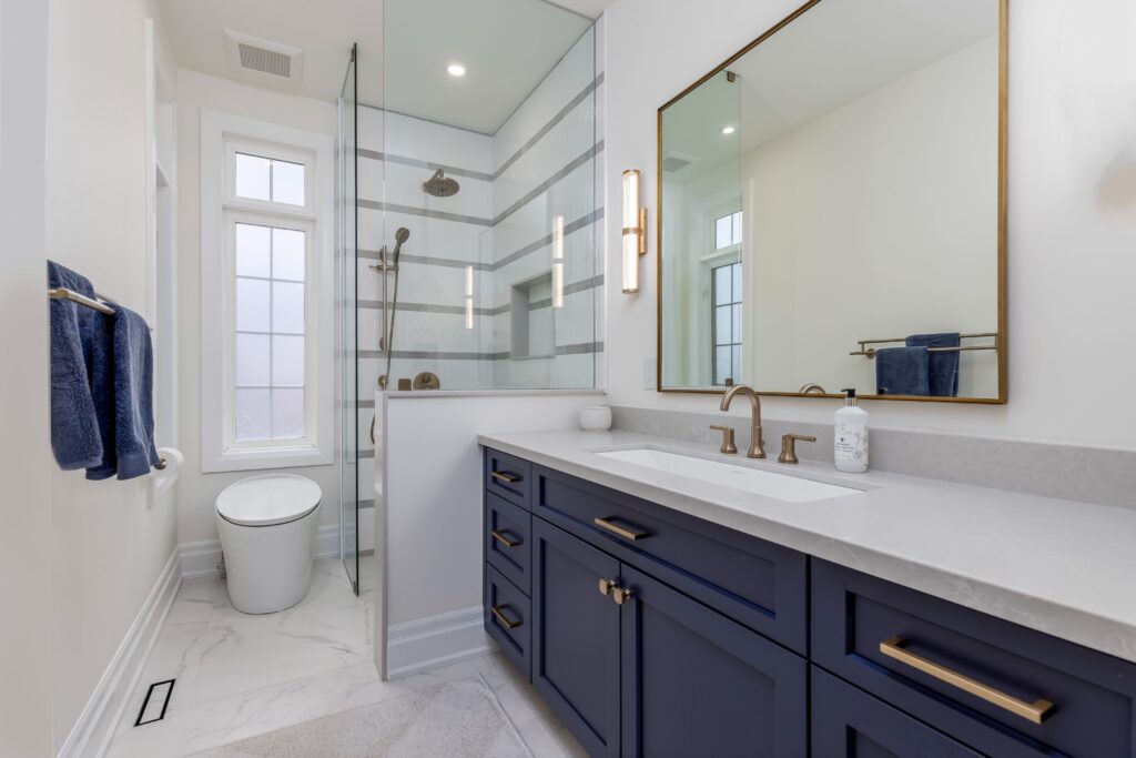 modern bathroom with navy vanity