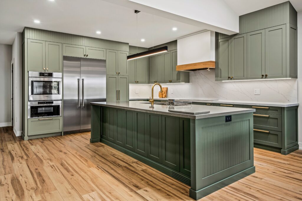 open concept green kitchen