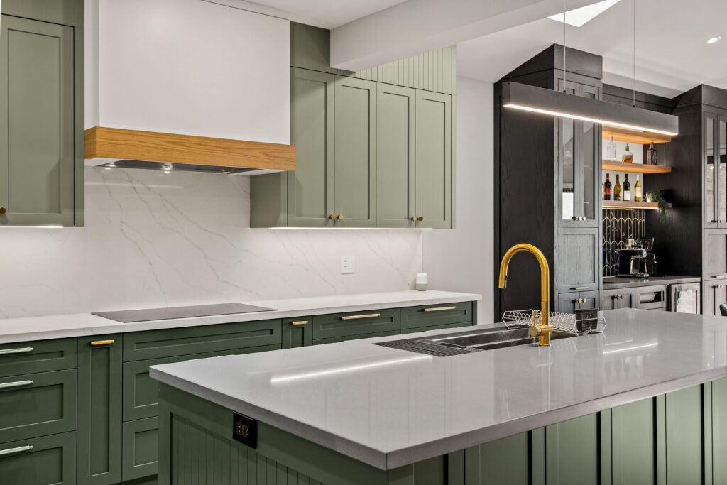 open concept green kitchen