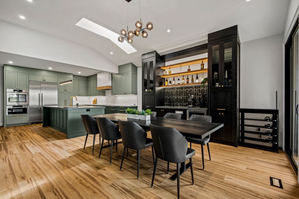 open concept green kitchen