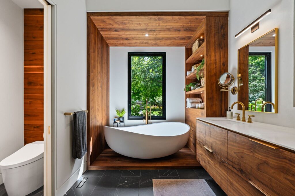 Walnut Millwork and Black Marbled Tiles in Ensuite