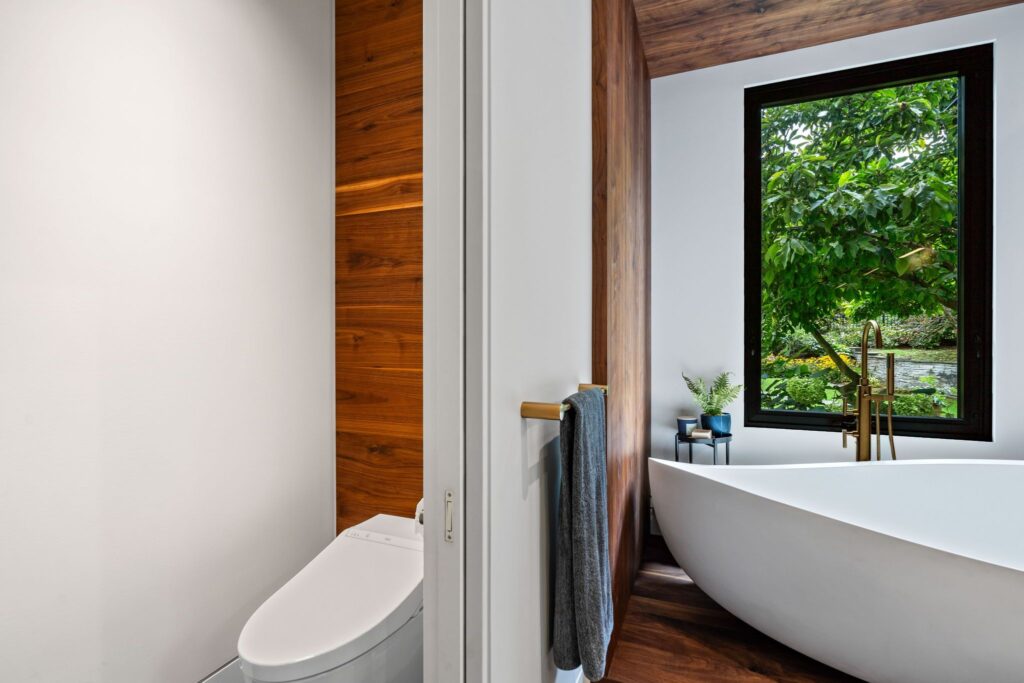 Contemporary Bathroom with Elevated Tub and Garden Vista