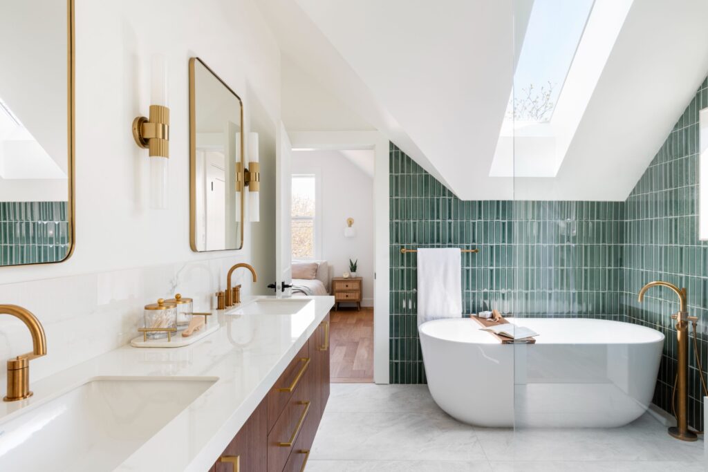 Brushed gold fixtures providing elegance throughout the ensuite.