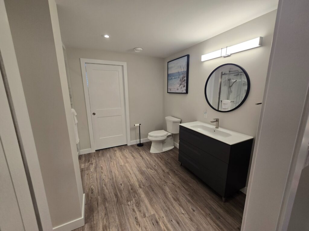 The comfortable ensuite bathroom with contemporary fixtures.