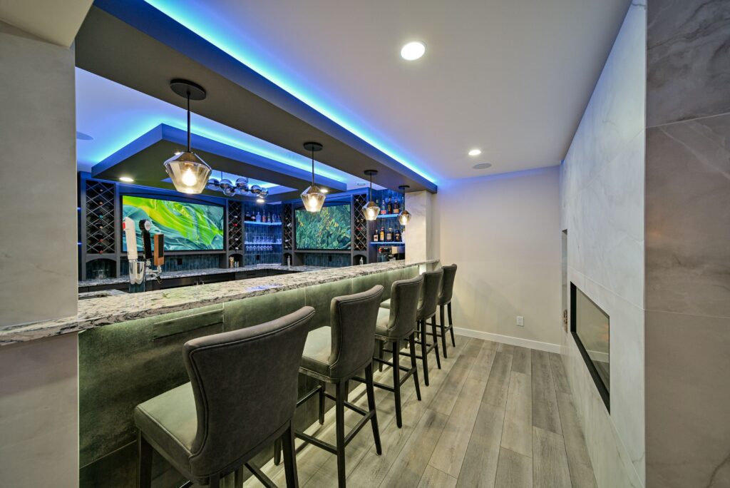 Cozy family lounge area with double-sided fireplace and plush seating.