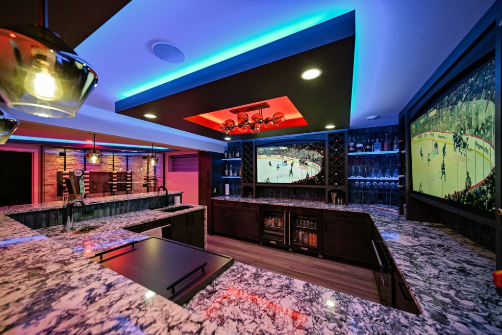 Wall-mounted smart screen displaying sports highlights.