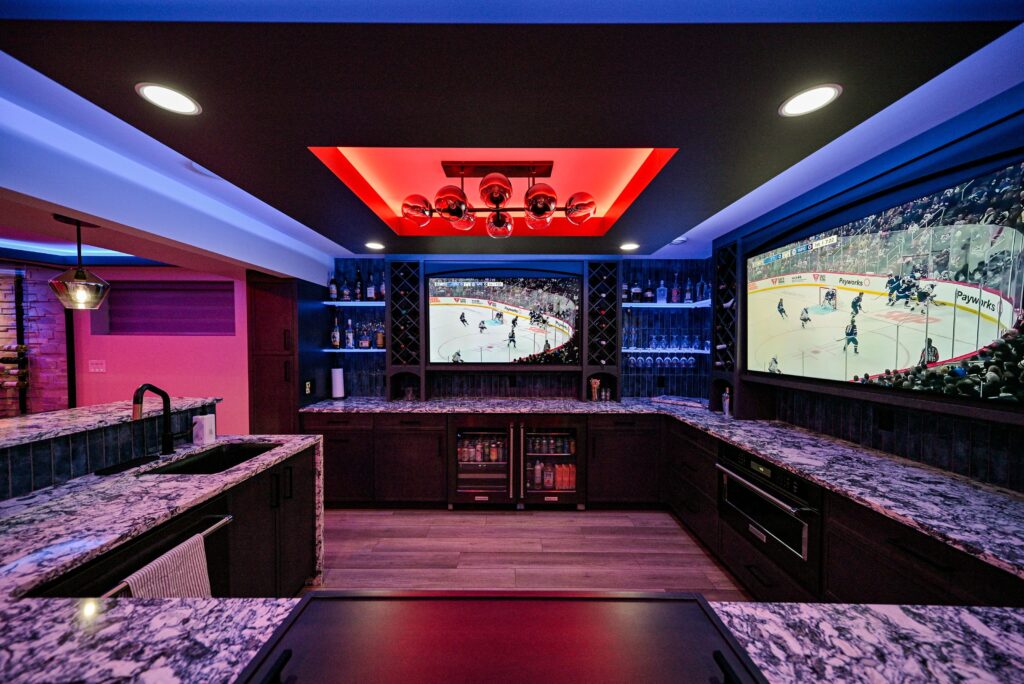 Wall-mounted smart home control tablet in bar area