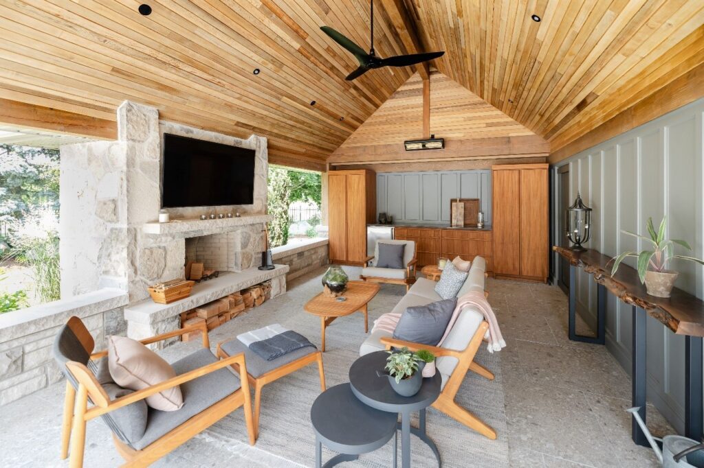 Outdoor living area with fireplace and storage wall