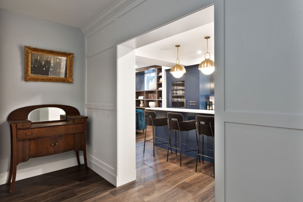 Speakeasy-inspired bar with elegant gold accents.