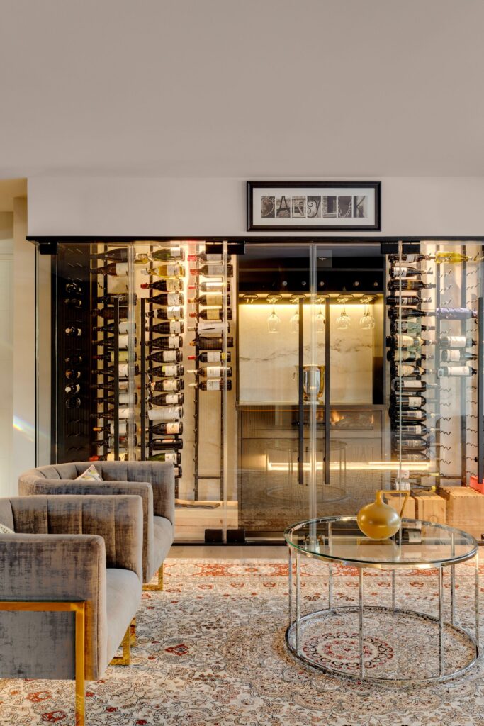 Glass-encased wine room seamlessly blending function and aesthetics.