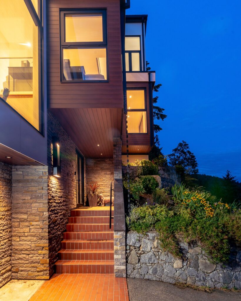 West Vancouver coastal home blending stone, glass, and wood