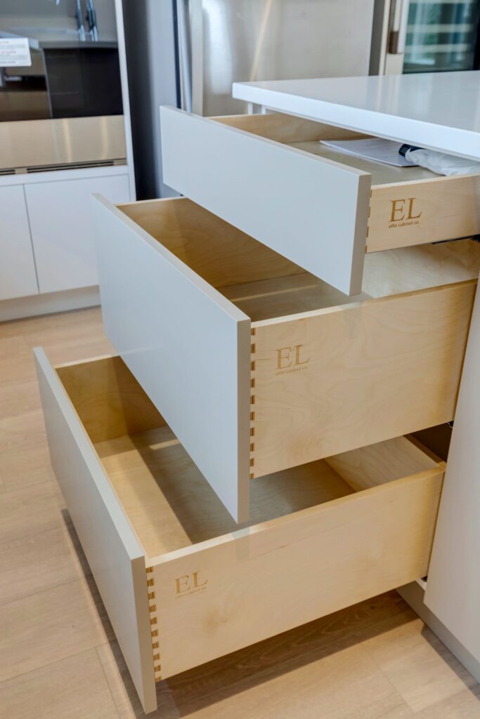 Kitchen island with ample storage and warm accent tones in modern home renovation.