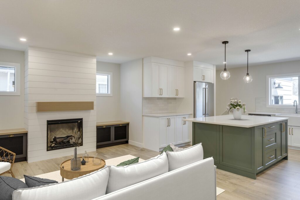 Modern open-concept kitchen and living room with a white sofa, green kitchen island, white cabinetry, stainless steel appliances, wood floors, and a fireplace with a white shiplap accent wall. Neutral, bright, and airy decor.